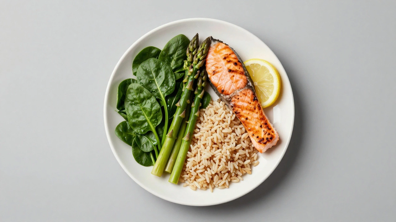 A balanced plate with half vegetables, a quarter salmon, and a quarter brown rice